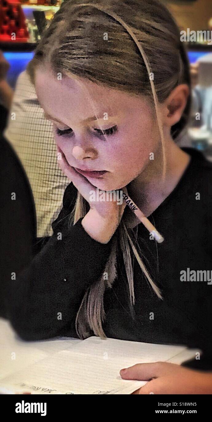 Reading girl. - Smartphone Captured Stock Image