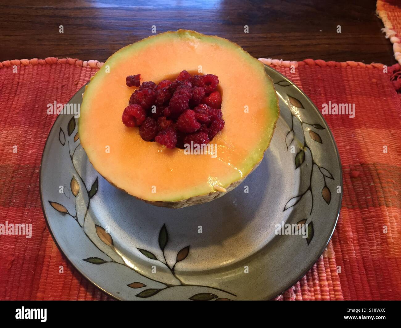 Raspberry Melon Homegrown raspberries and melons Stock Photo - Alamy