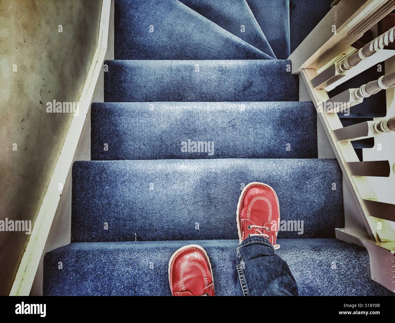 POV Walking down stairs, red shoes. - Smartphone Captured Stock Image