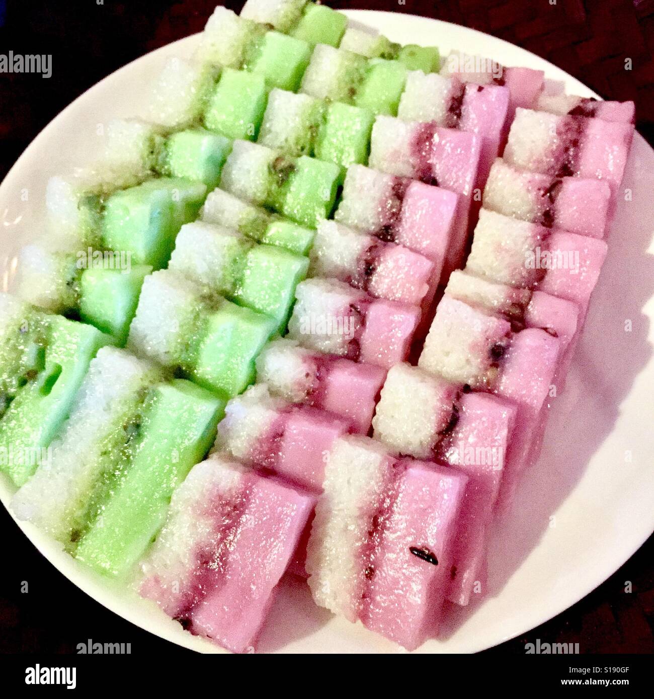 A colourful plate of Peranakan sticky rice desserts, Singapore Stock