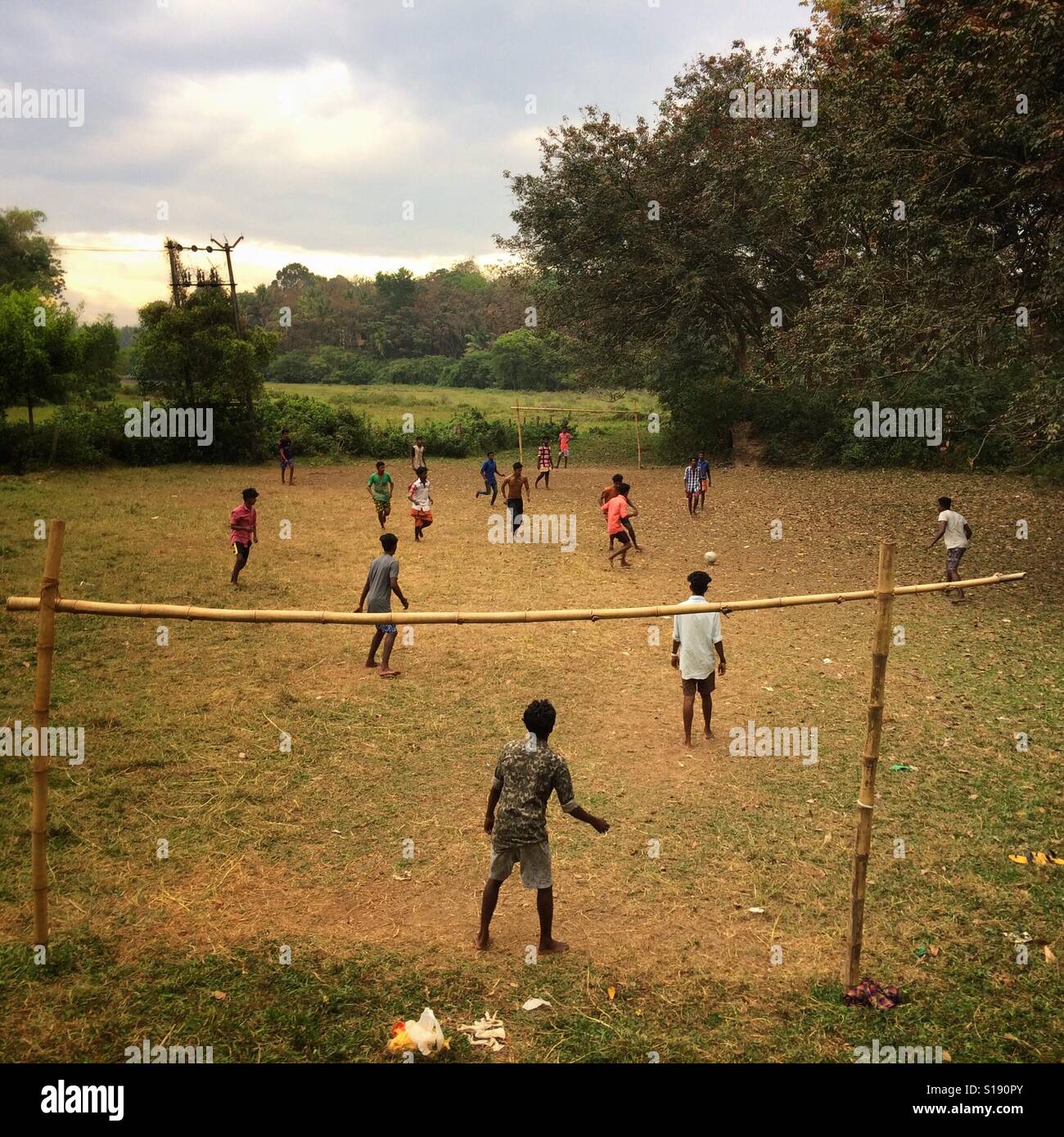 Boys play football in rural India Stock Photo Alamy