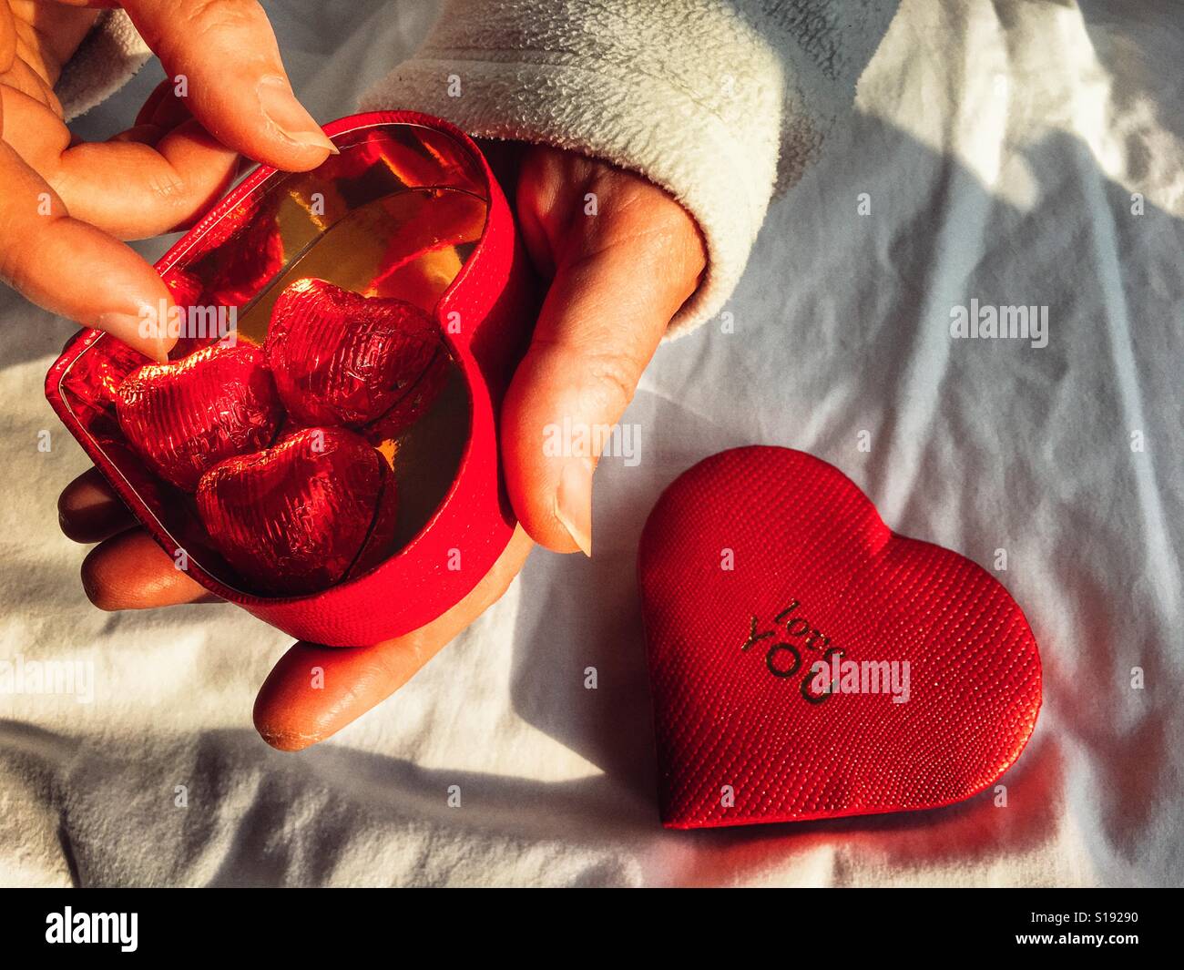 Enjoying Valentine's Day chocolate - Smartphone Captured Stock Image