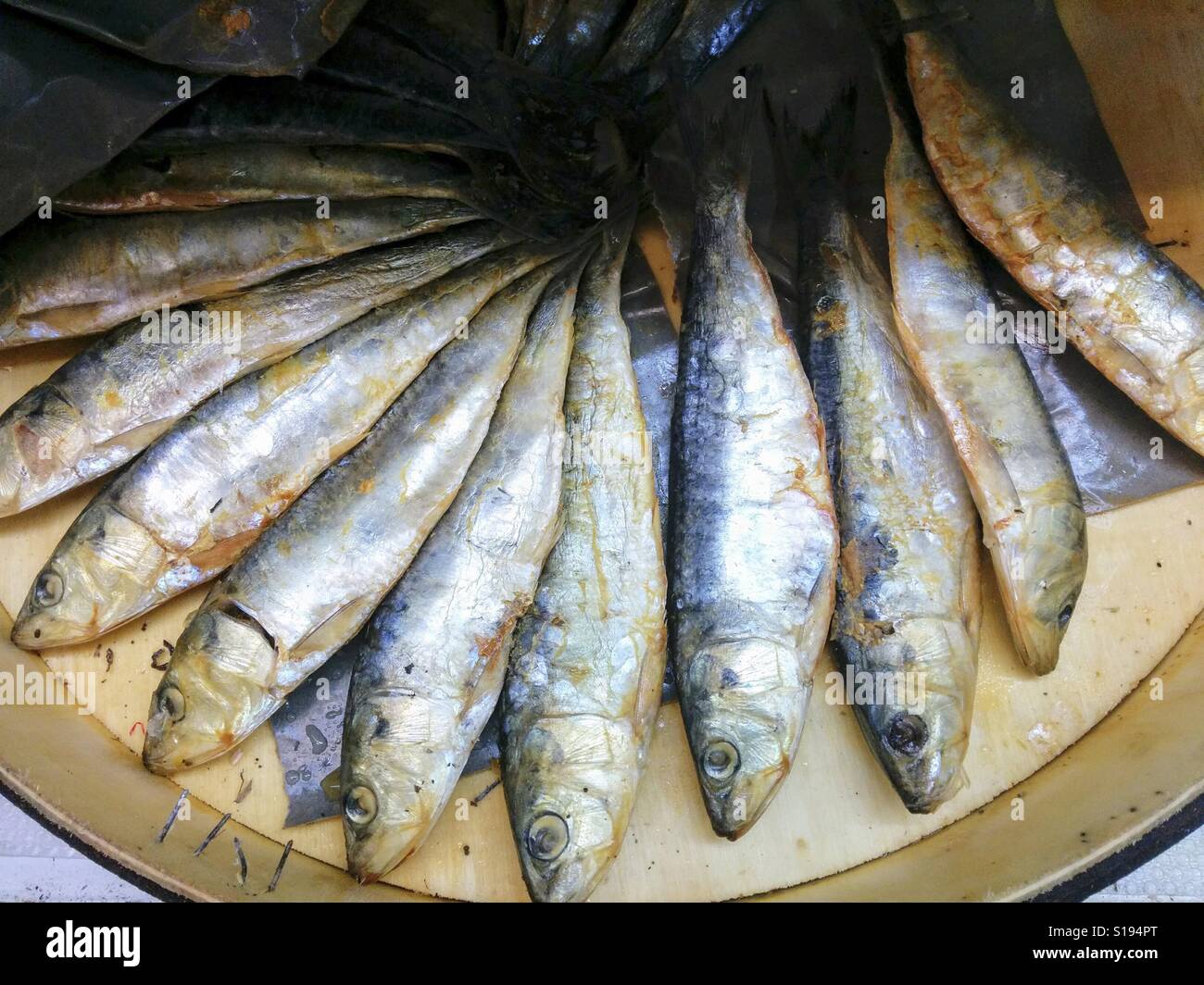 Salted herrings for sale Stock Photo Alamy