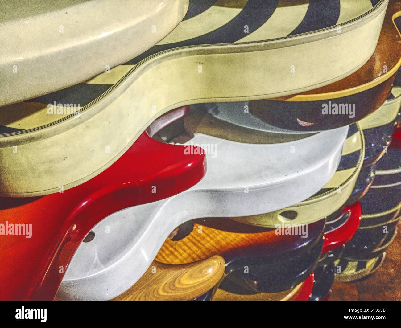 Display wall of electric guitar bodies, hard rock café, Times Square, NYC, USA - Smartphone Captured Stock Image