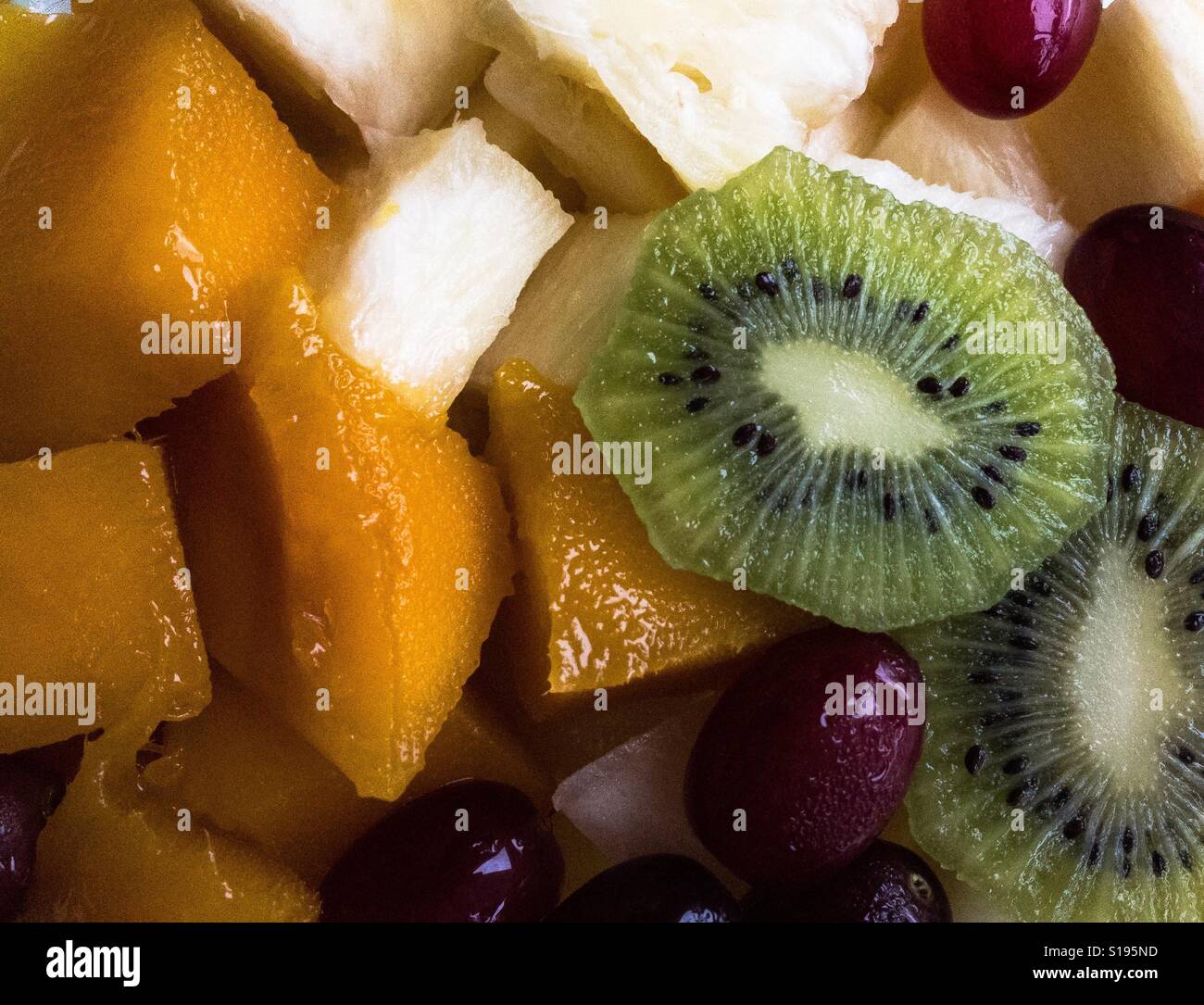 Melon pineapple fruit salad smartphone stock photos and images - Alamy