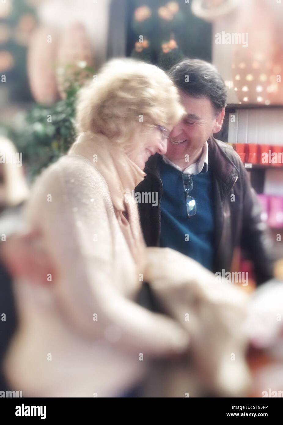 Couple in love laughing - Smartphone Captured Stock Image