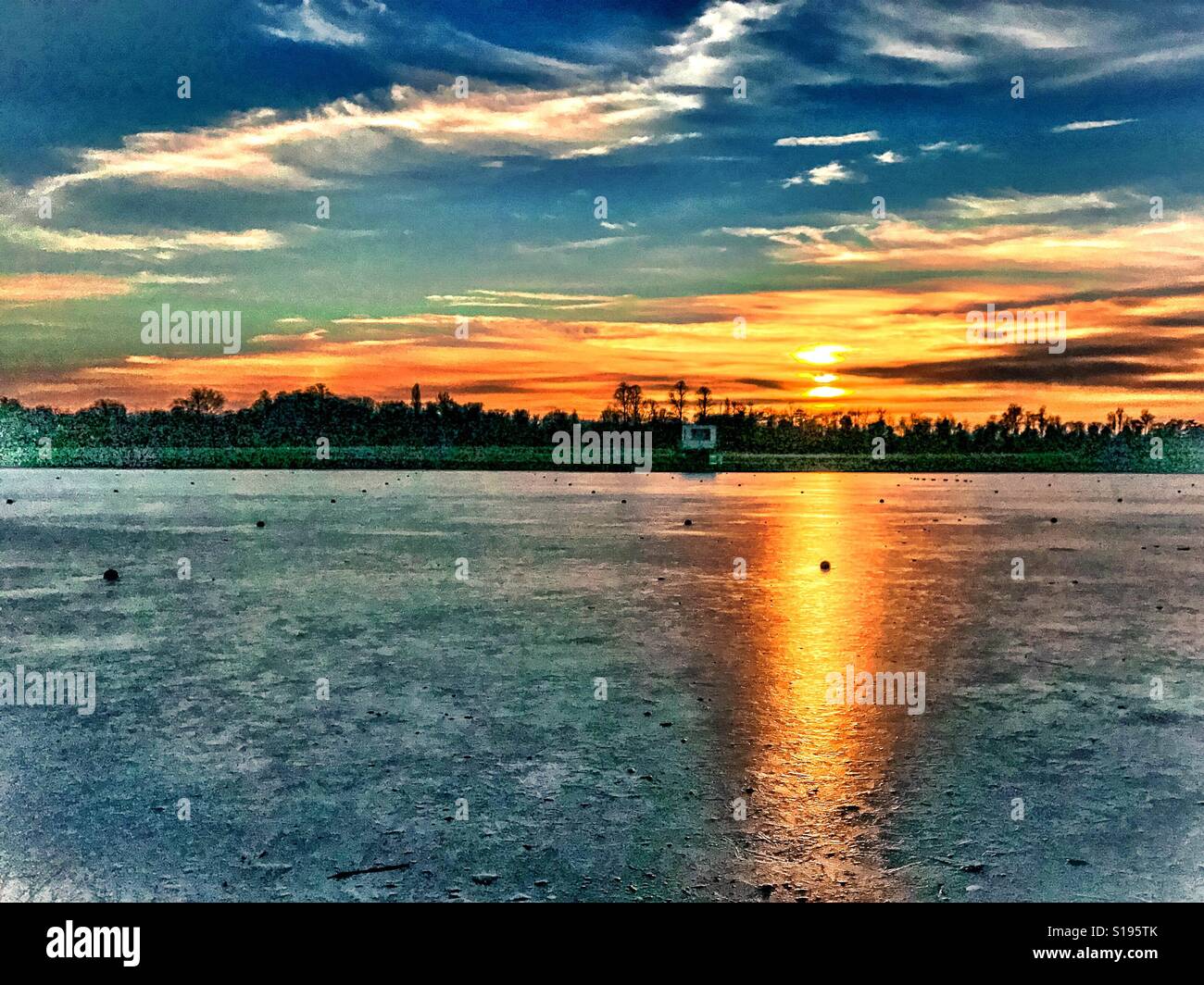 Sunset over a frozen Dorney Lake Stock Photo