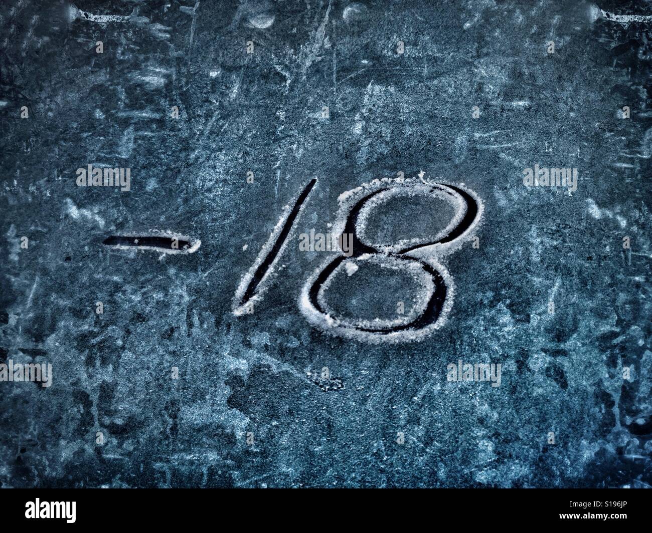 -18 written in a ice floor - Smartphone Captured Stock Image