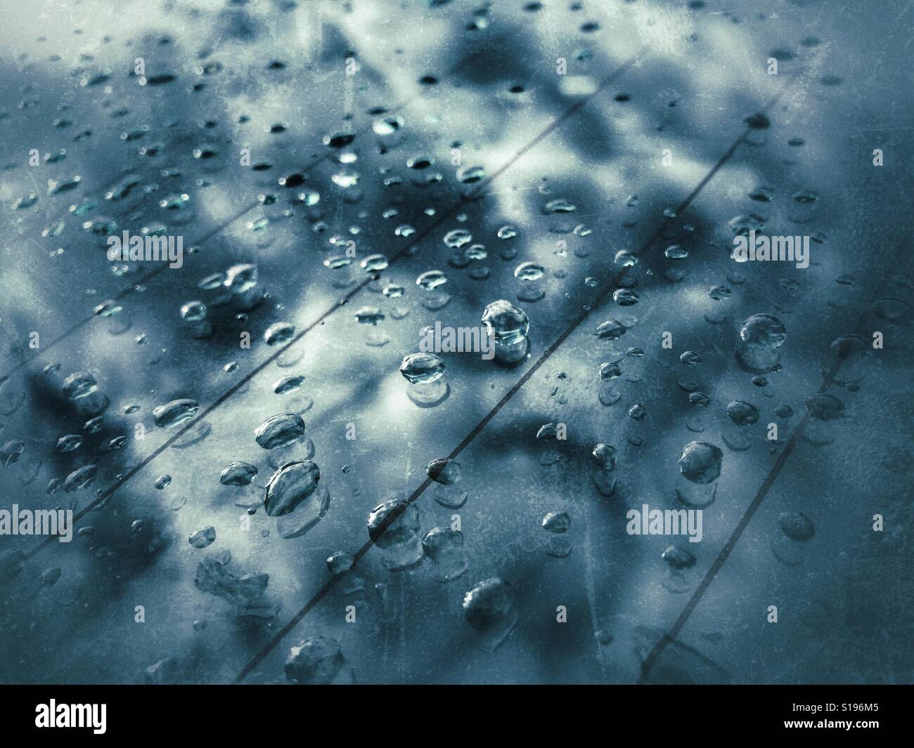 Water droplets on window glass - Smartphone Captured Stock Image