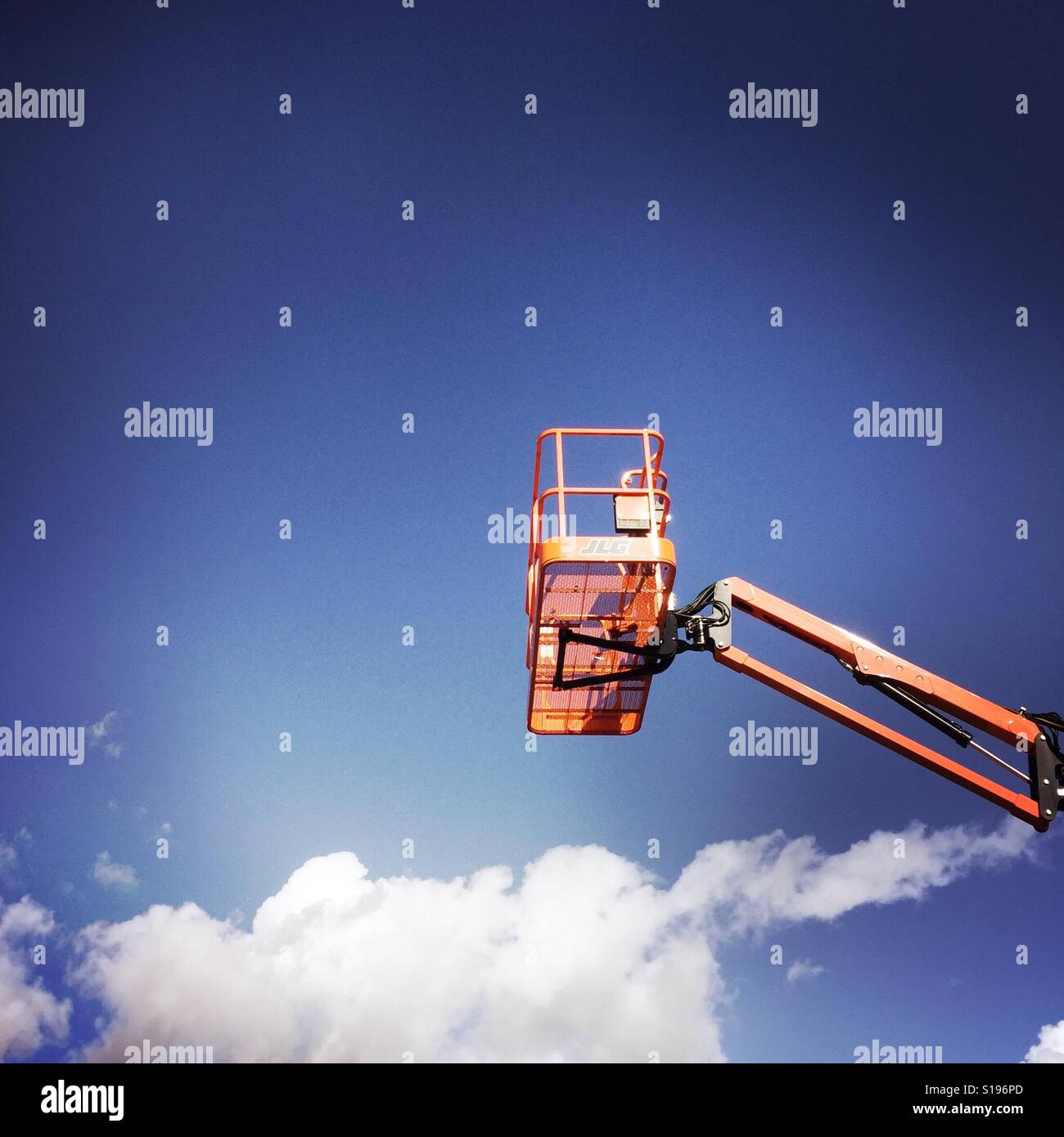 A crane and clouds. - Smartphone Captured Stock Image