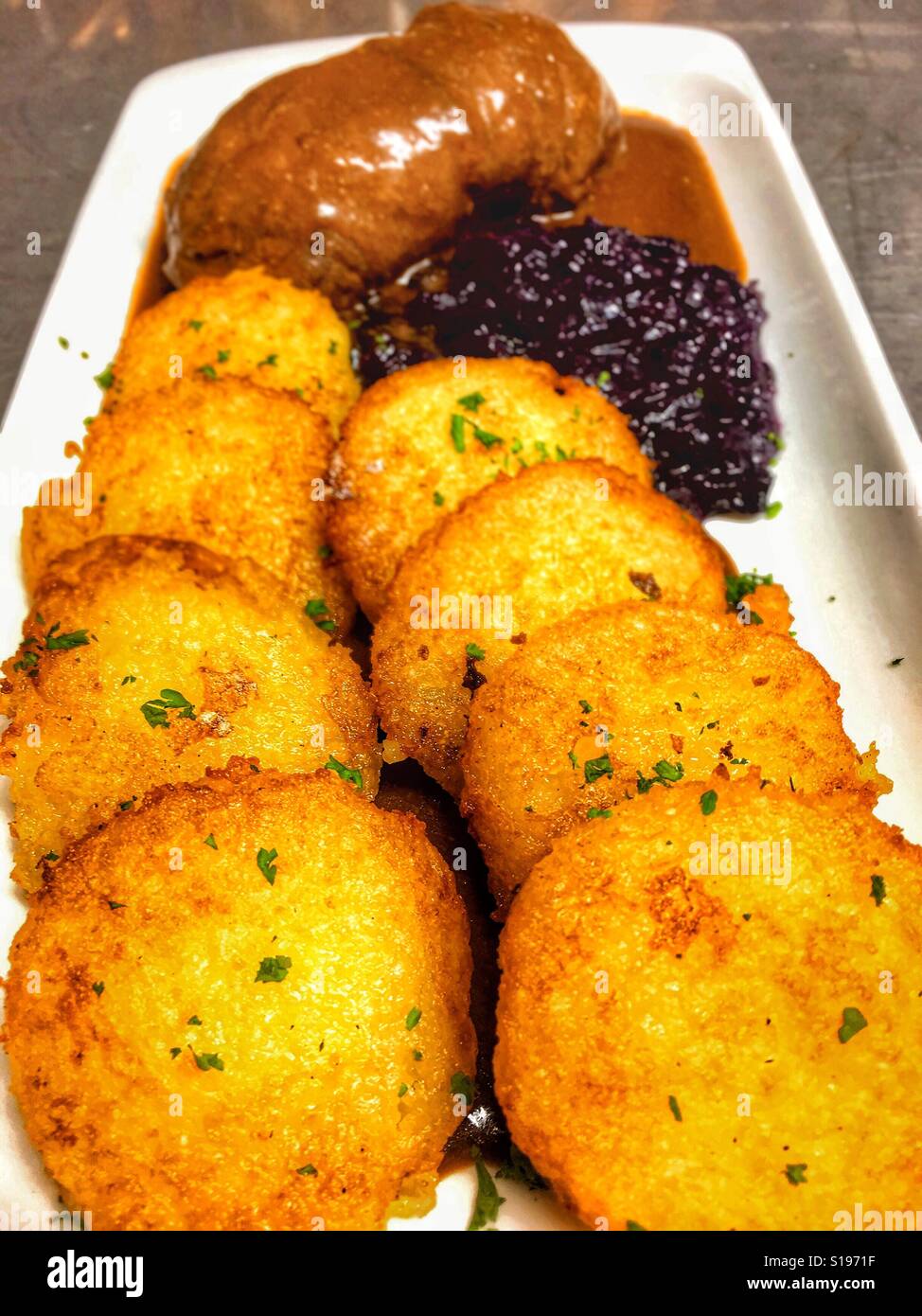 Dumplings with meat and red cabbage ; very big portion Stock Photo Alamy