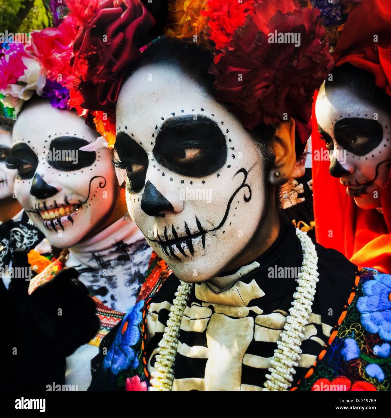 Young girls, representing a Mexican cultural icon called La Catrina, take a part in celebrations of the Day of the Dead (Día de Muertos) in Mexico City, Mexico, 29 October 2016. Stock Photo