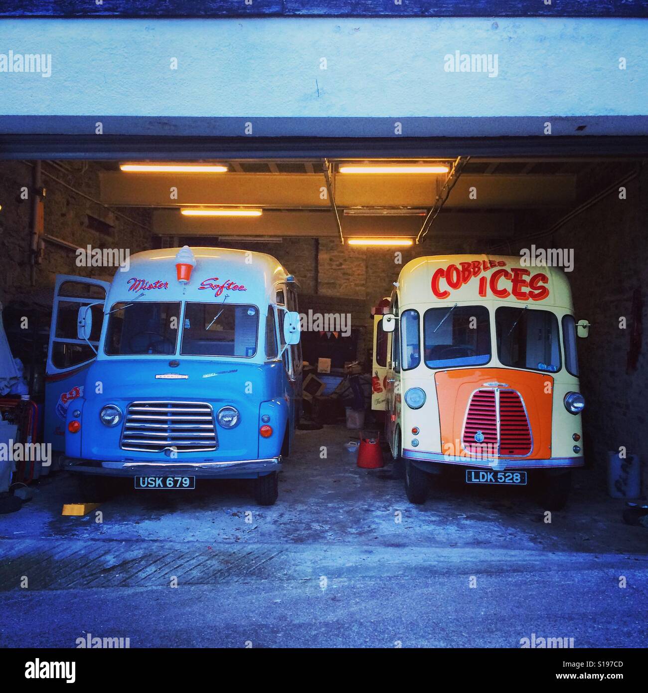 Two vintage ice cream vans in a garage Stock Photo Alamy