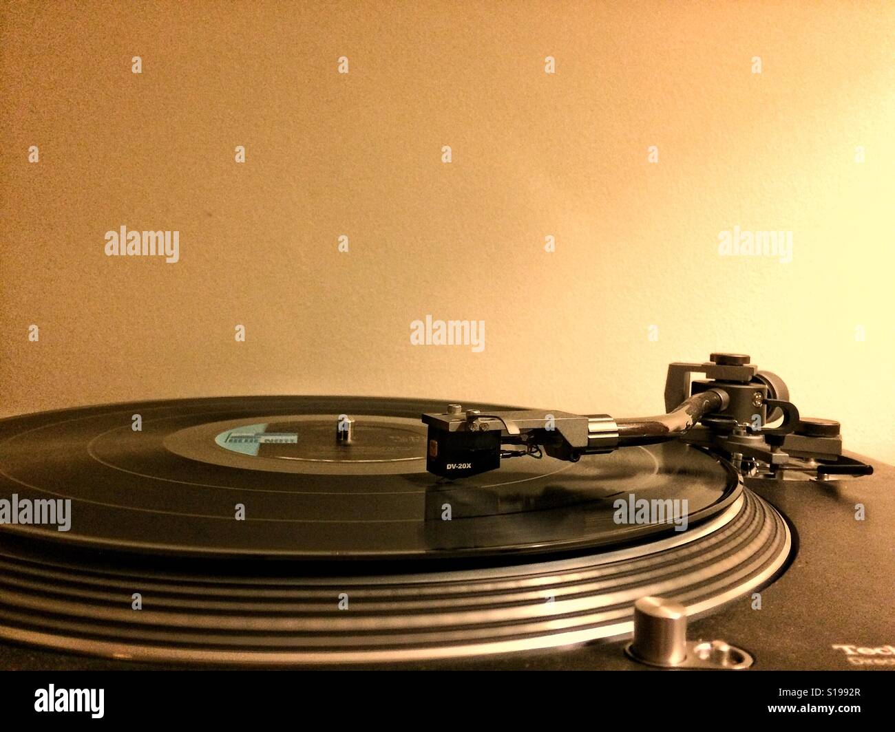 Technics turntable spinning a record Stock Photo