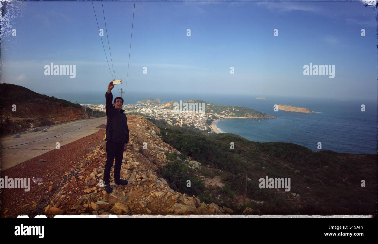 Man taking selfie. - Smartphone Captured Stock Image