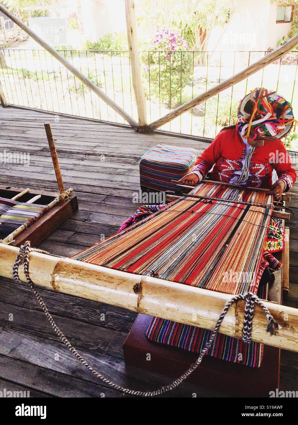 A traditional weaver of alpaca wool in Arequipa, Peru Stock Photo