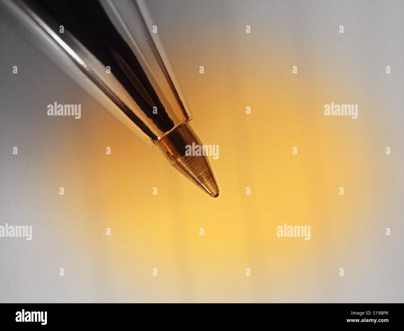 Close up of a ballpoint pen with vignette filter applied - Smartphone Captured Stock Image