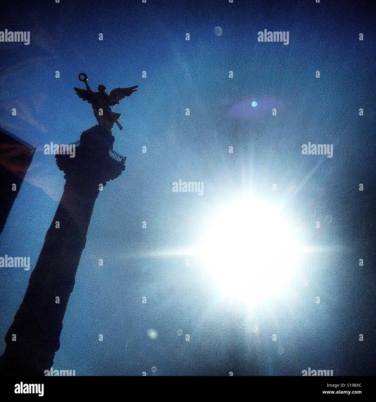 The sun shines by the Angel of Independence monument in Mexico City, Mexico Stock Photo