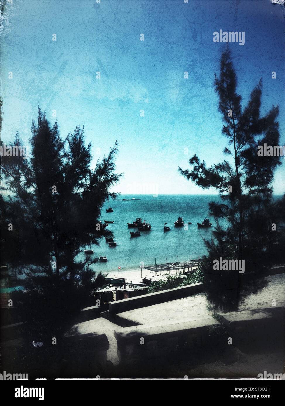 Fishing vessels at the beach. - Smartphone Captured Stock Image