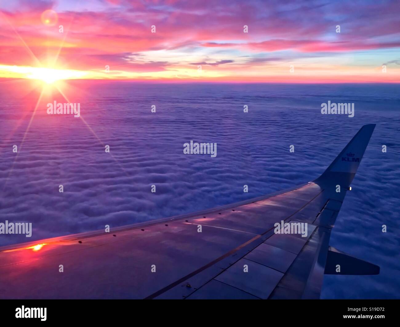 Flying above the clouds Stock Photo Alamy