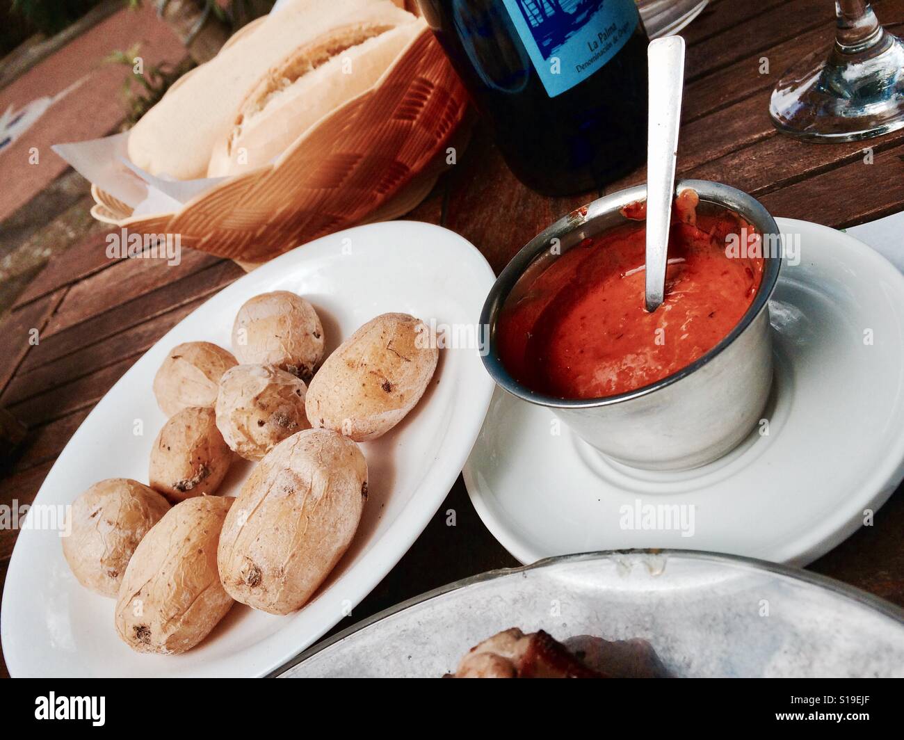 Canarian Wrinkled Potatoes with Mojo Rojo – Traditional Papas Arrugadas from the Canary Islands Stock Photo