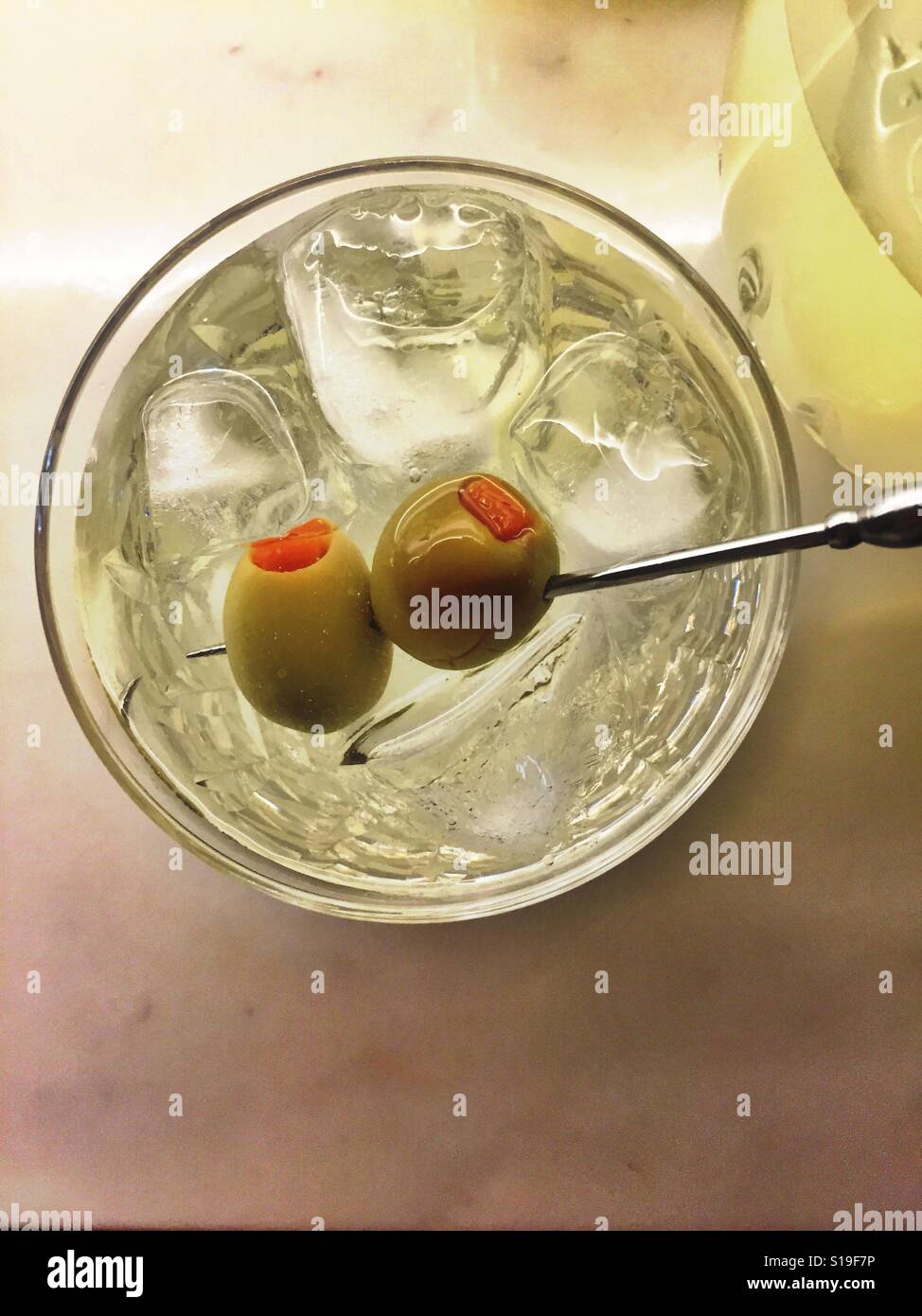 Martini cocktail on the rocks with two olives - Smartphone Captured Stock Image