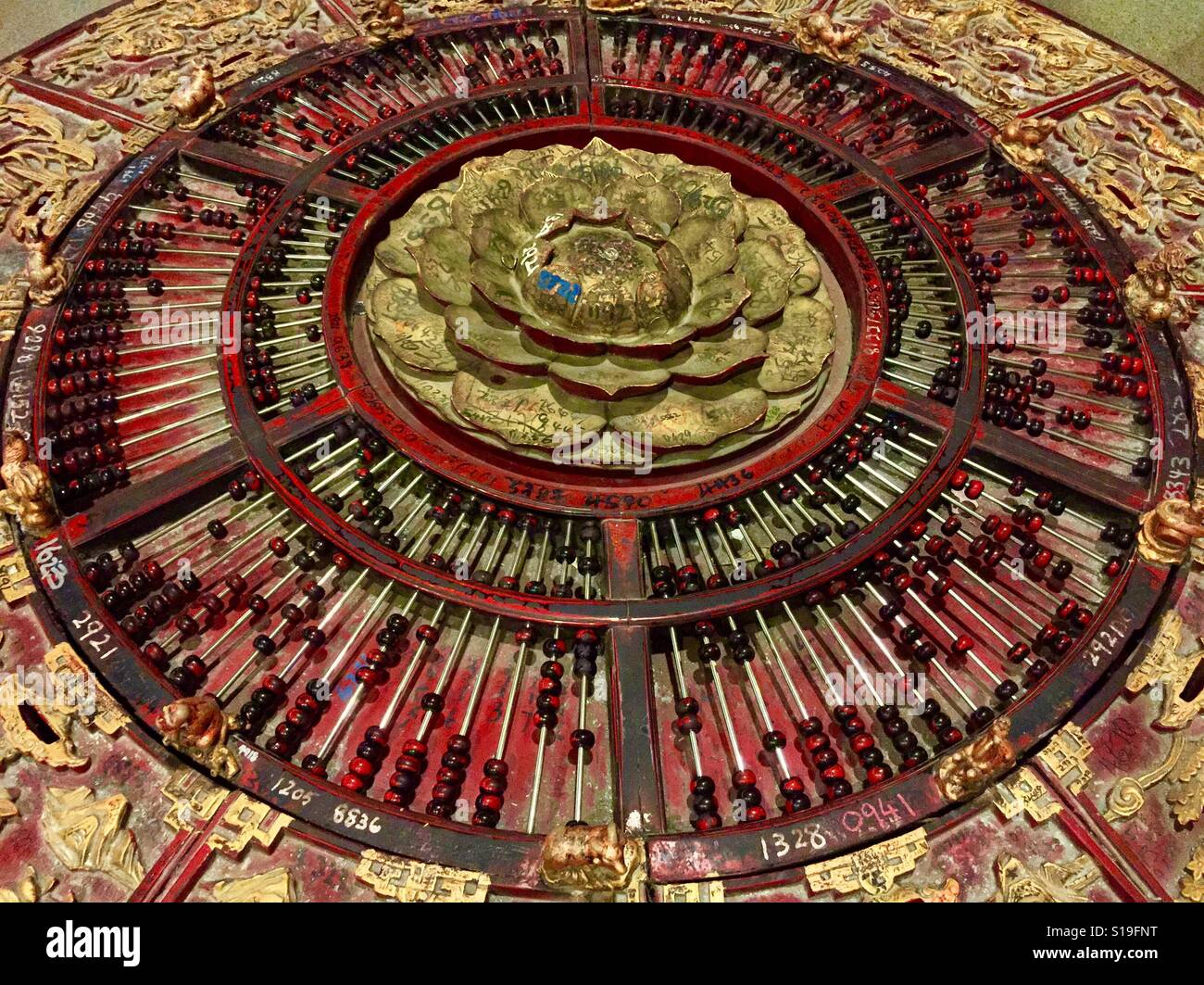 A Chinese circular abacus at Loyang Tua Pek Kong, Singapore Stock Photo