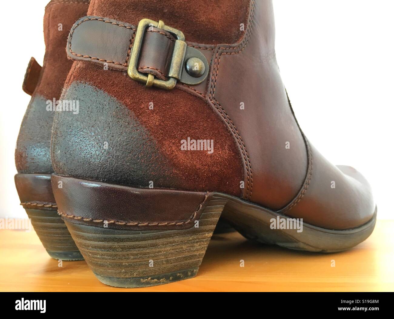 Brown leather ankle boots - Smartphone Captured Stock Image