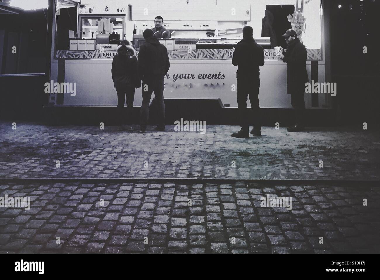 Food truck on cobblestone road - Smartphone Captured Stock Image