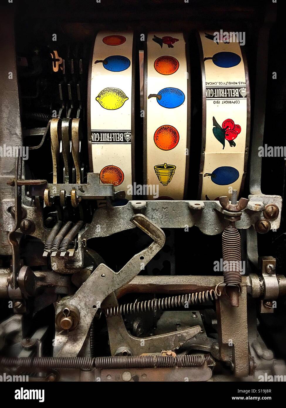 The insides of an old slot machine. Stock Photo