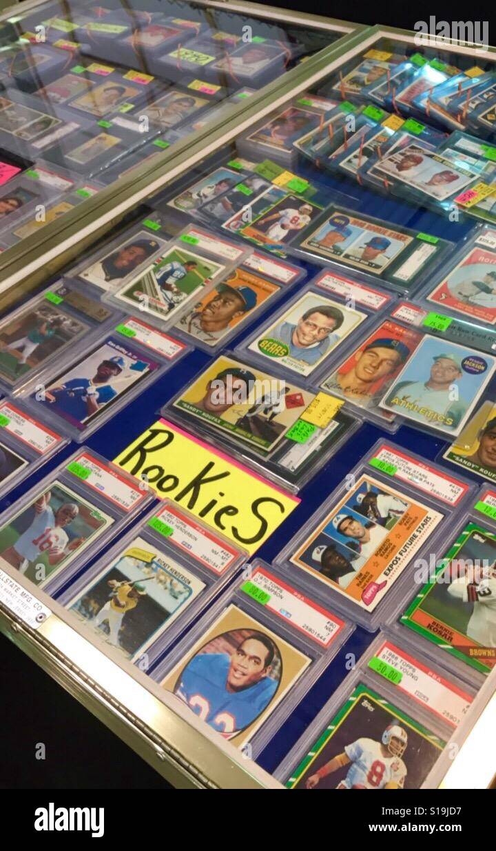 Glass Display Case of Rookie Sports Cards Stock Photo