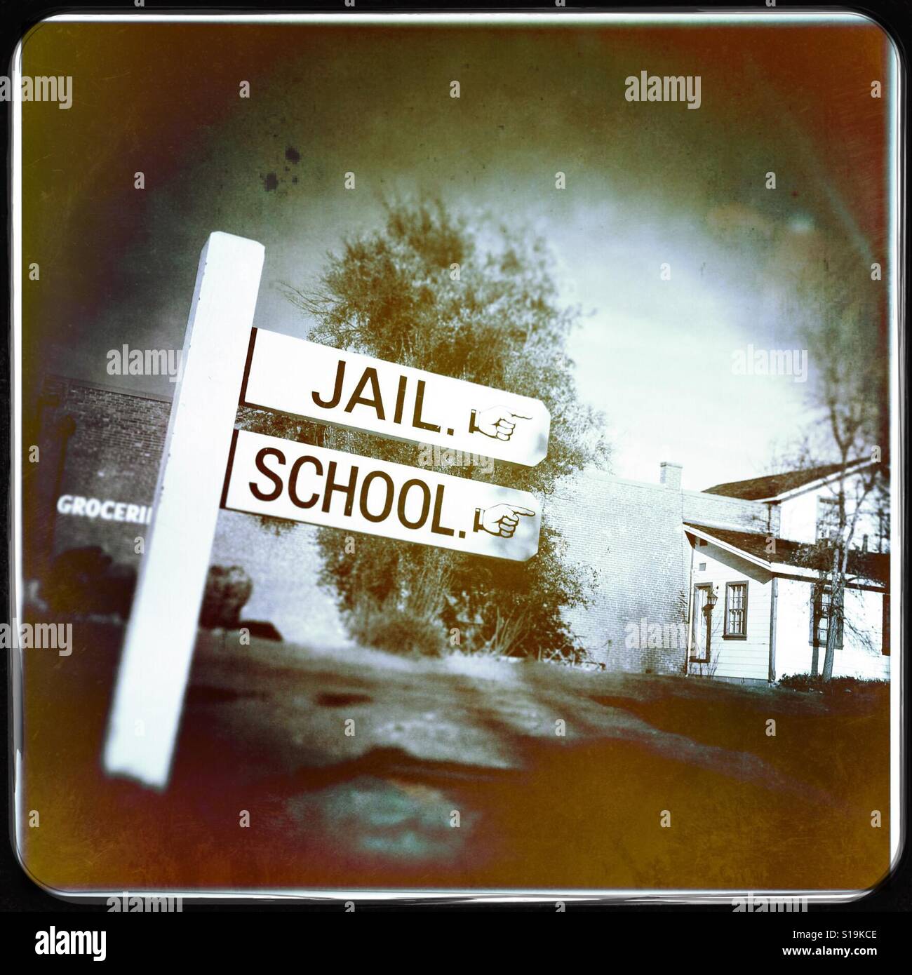 Jail and school sign on Main Street. Columbia State Historic Park, Tuolumne County, California, USA - Smartphone Captured Stock Image