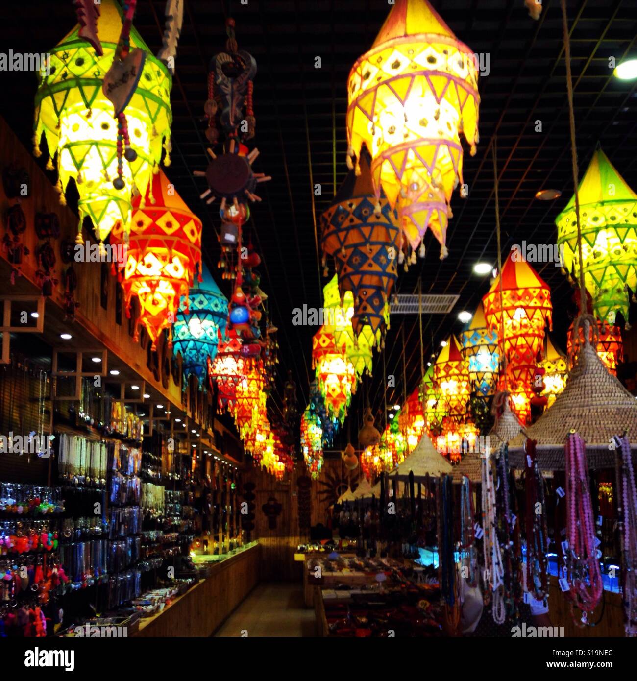 Coloured lanterns hanging in rows Stock Photo