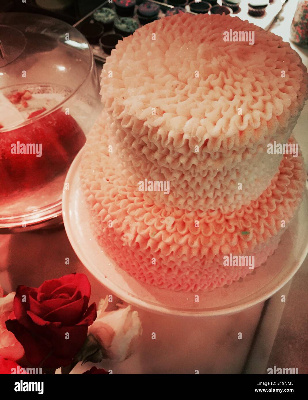 Valentine's Day cake on display in bakery, USA - Smartphone Captured Stock Image