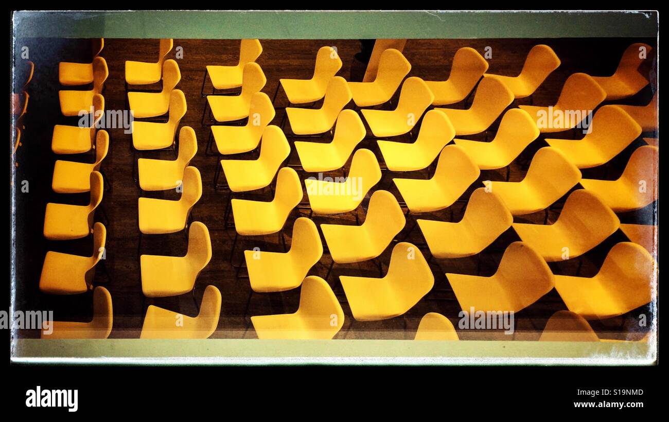 Rows of yellow chairs - Smartphone Captured Stock Image