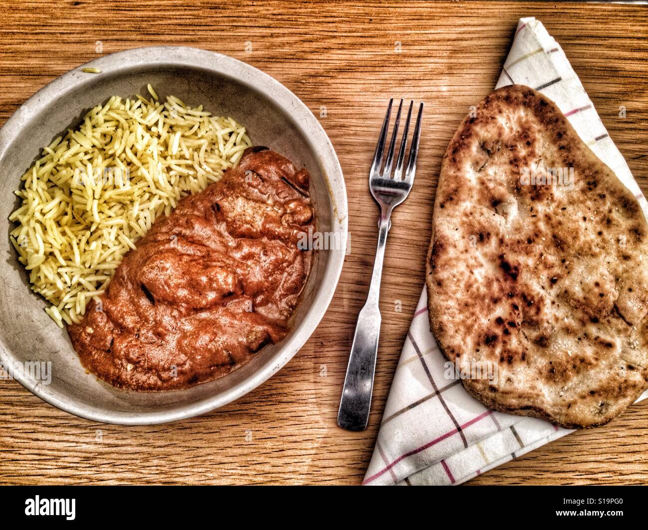 Coop Indian chicken Madras with Pilau rice and Naan bread Stock Photo Alamy