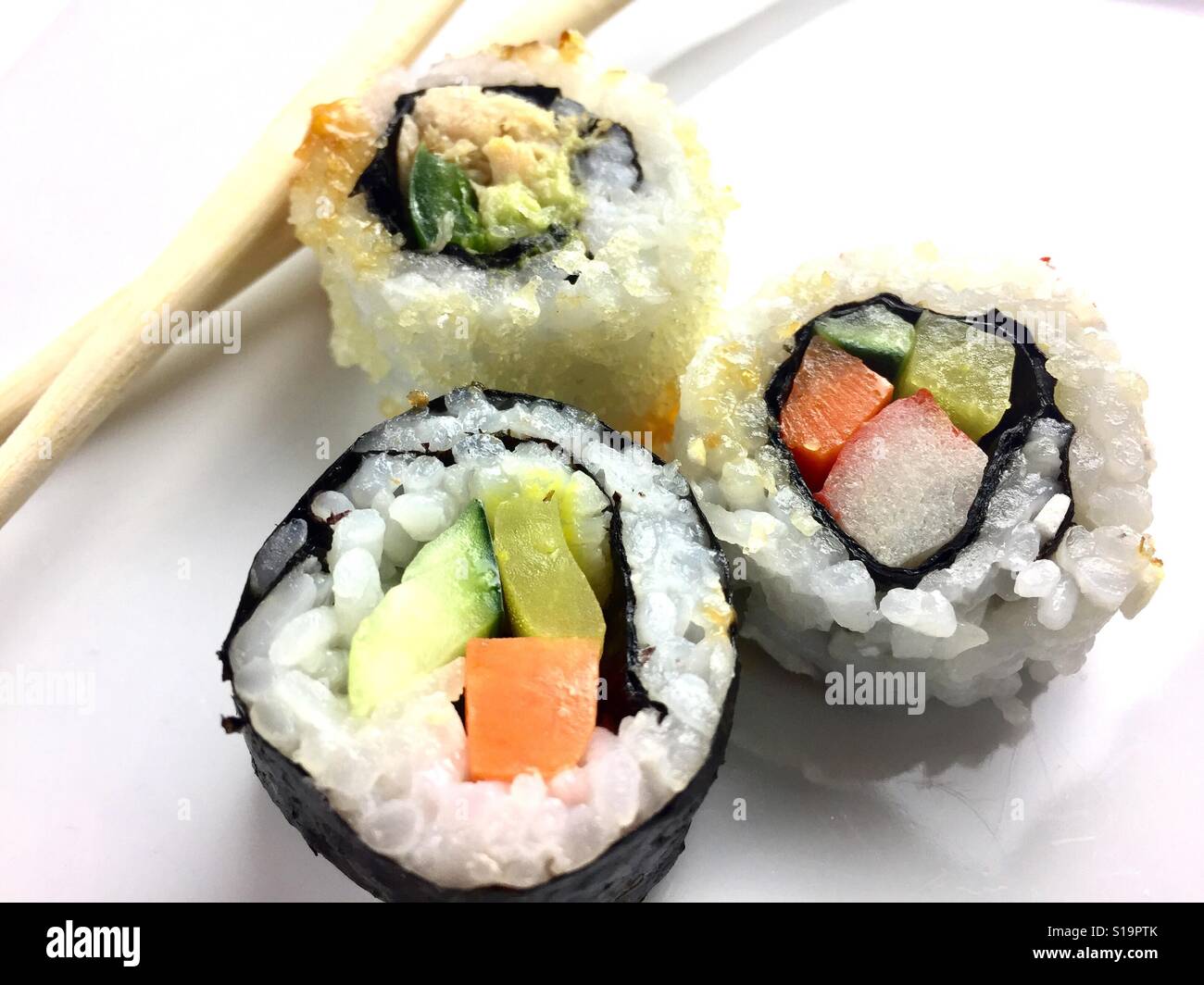 Sushi with chopsticks - Smartphone Captured Stock Image