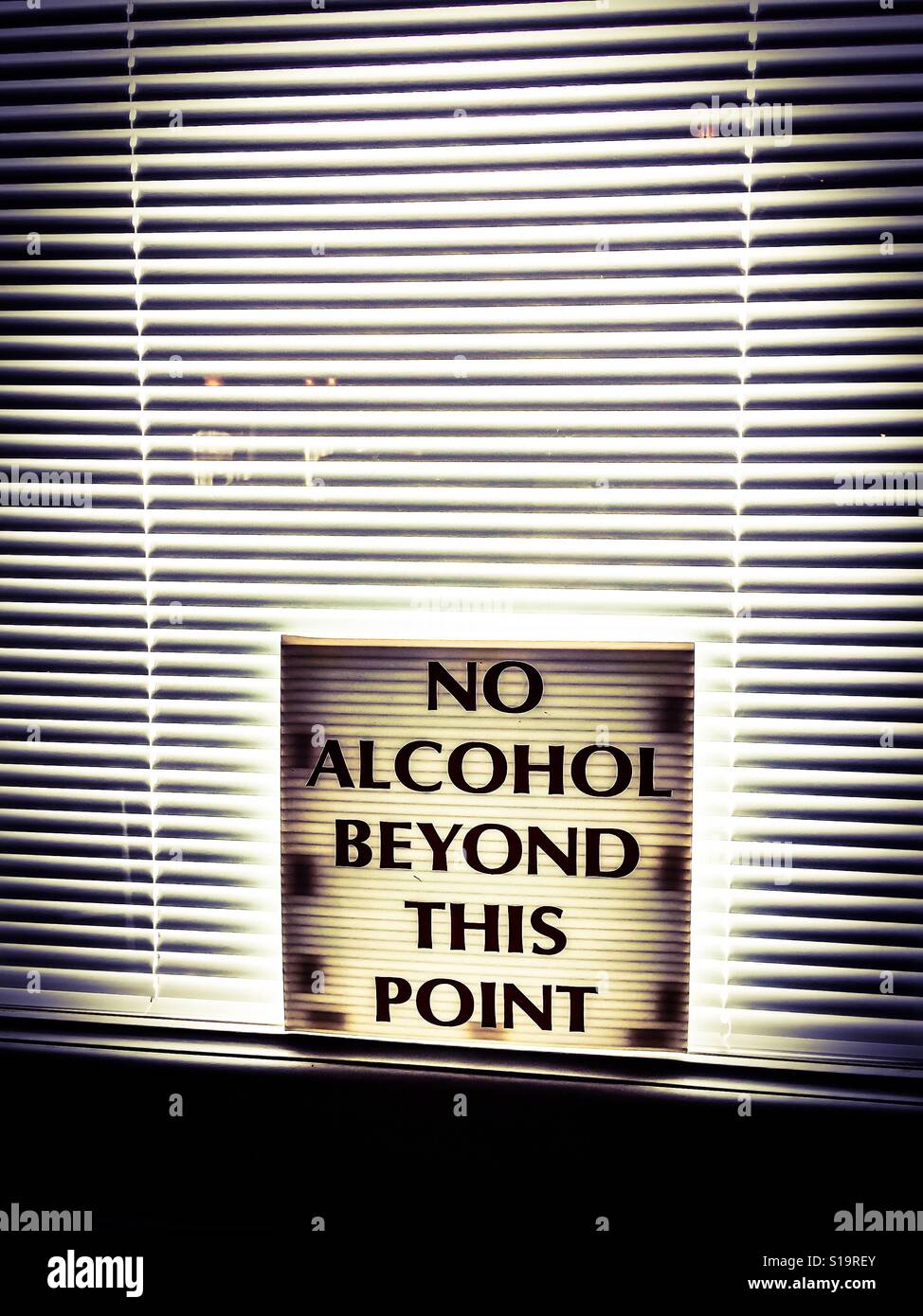 Party limits.  No Alcohol beyond this point. Booze boundary. Do not cross with a beer or hard drink in hand. Spatial separation. Off limits - Smartphone Captured Stock Image