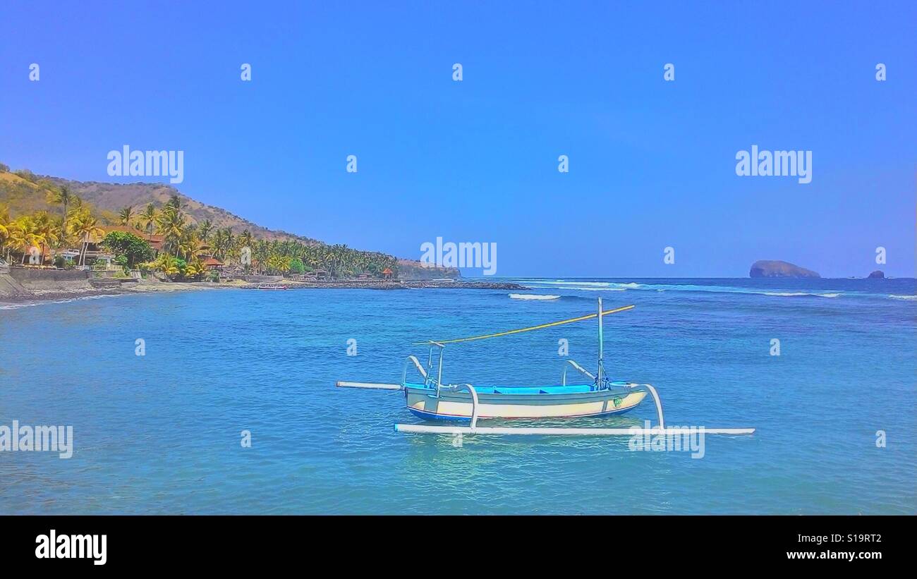 Traditional Fisherman Boat at sea in Flores Island Stock Photo