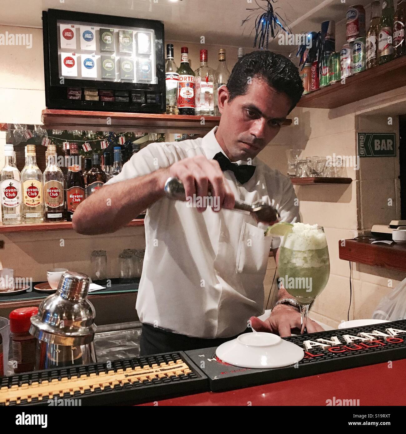 Waiter making mojito drink , Havana - Smartphone Captured Stock Image