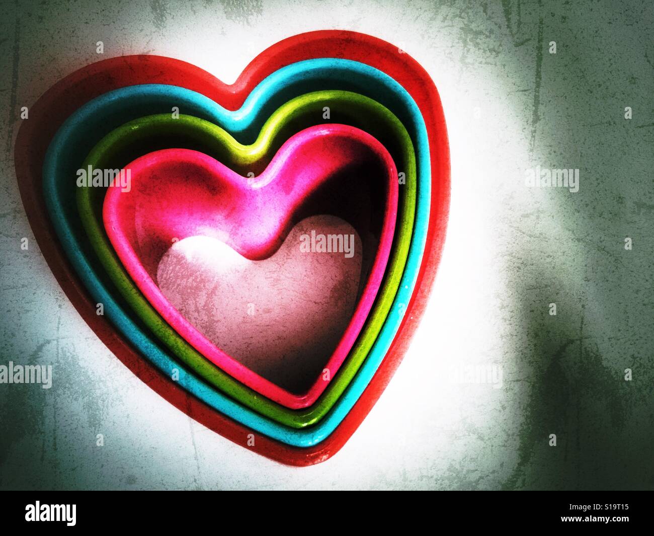 Love hearts. Plastic heart shaped cookie cutters - Smartphone Captured Stock Image