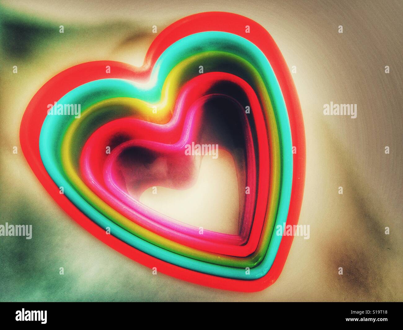 Love hearts. Plastic heart shaped cookie cutters - Smartphone Captured Stock Image