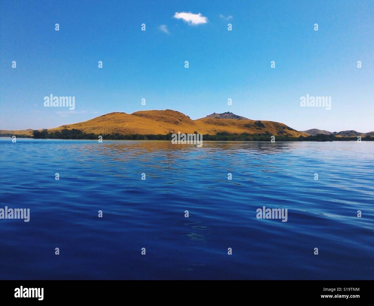 Komodo Islands view From The Sea Stock Photo