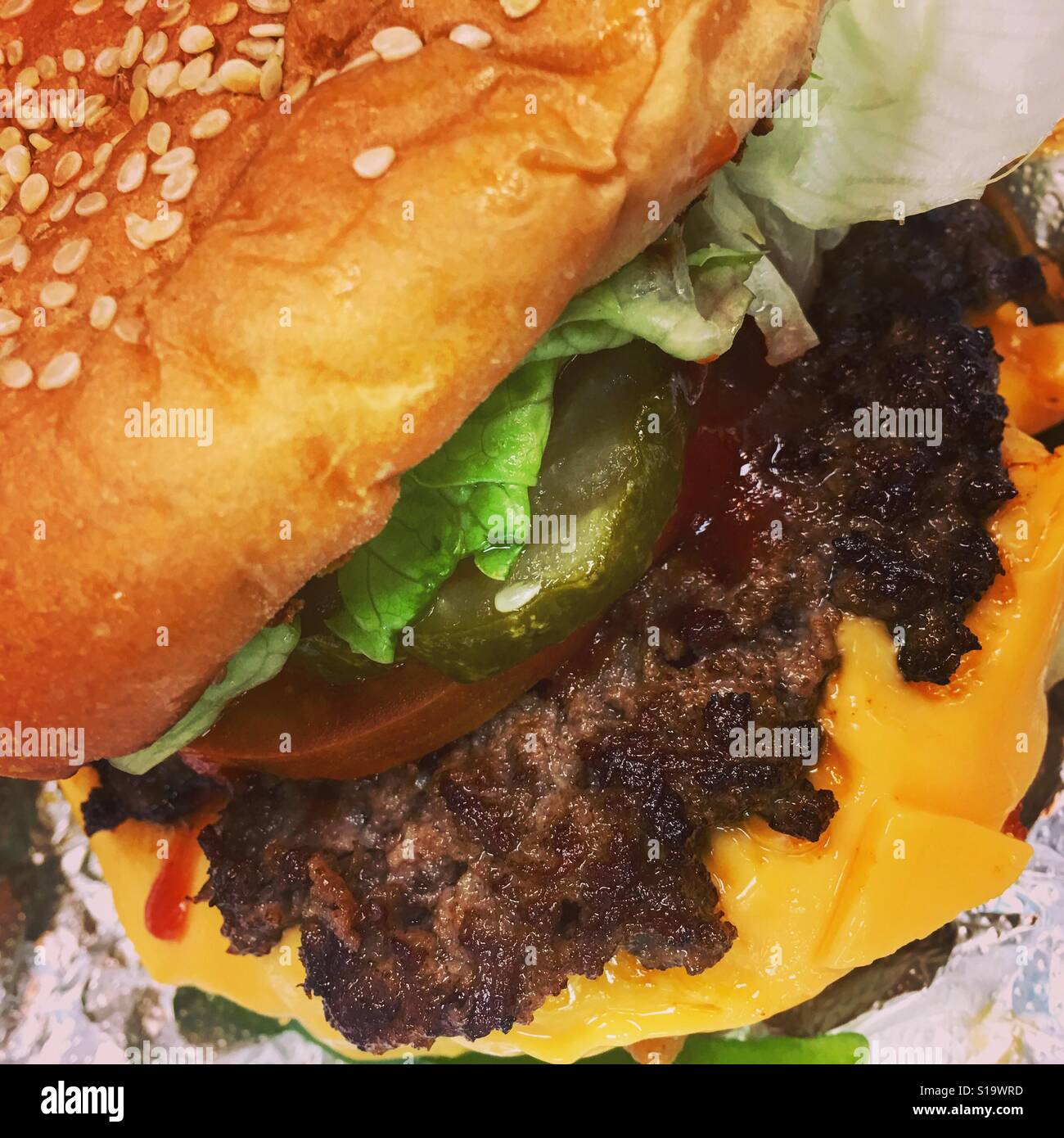 Close-up of a Cheeseburger. Stock Photo