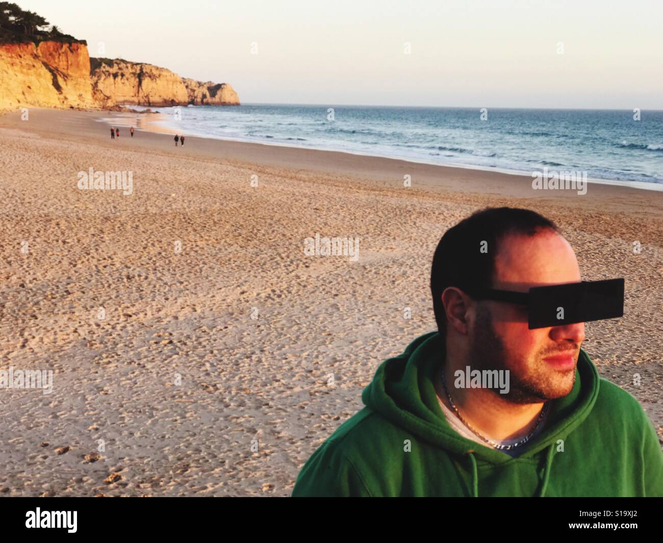 Man with sunglasses on the beach, Lagos Portugal - Smartphone Captured Stock Image