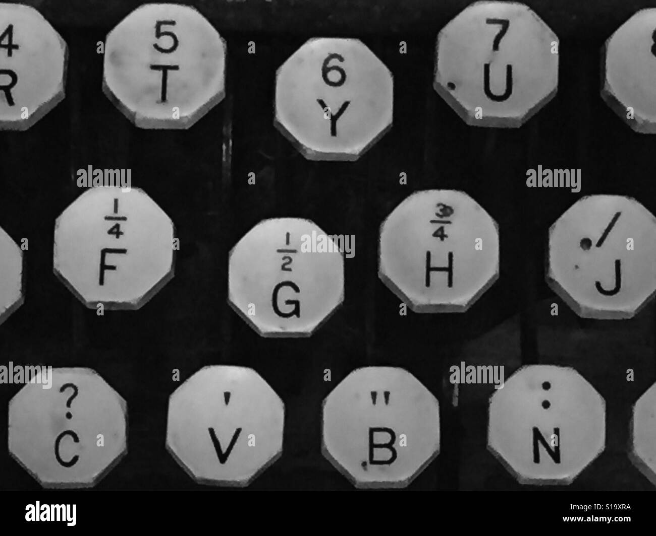 Black and white up close photo of vintage typewriter keys Stock Photo