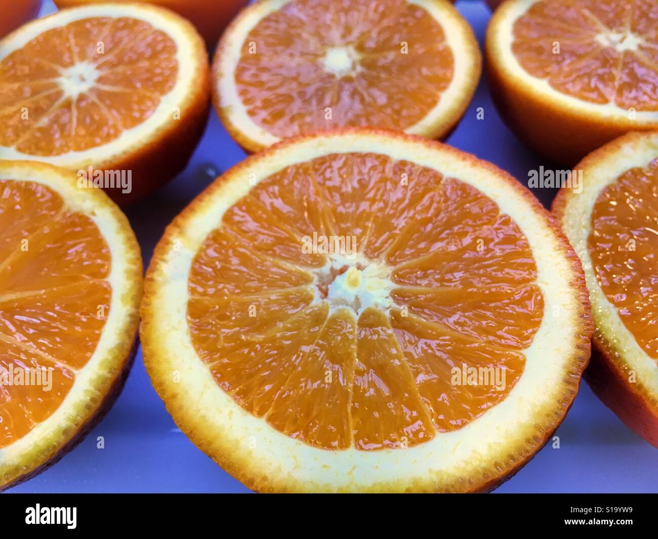 Oranges cut in half, ready for juicing - Smartphone Captured Stock Image