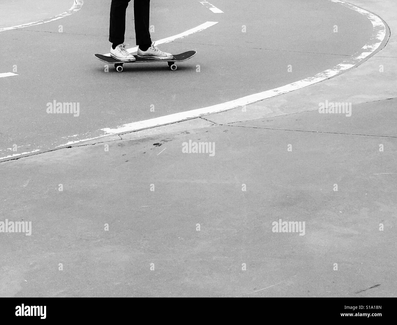 Teenager skates in skate park, São João de Estoril, Portugal. - Smartphone Captured Stock Image