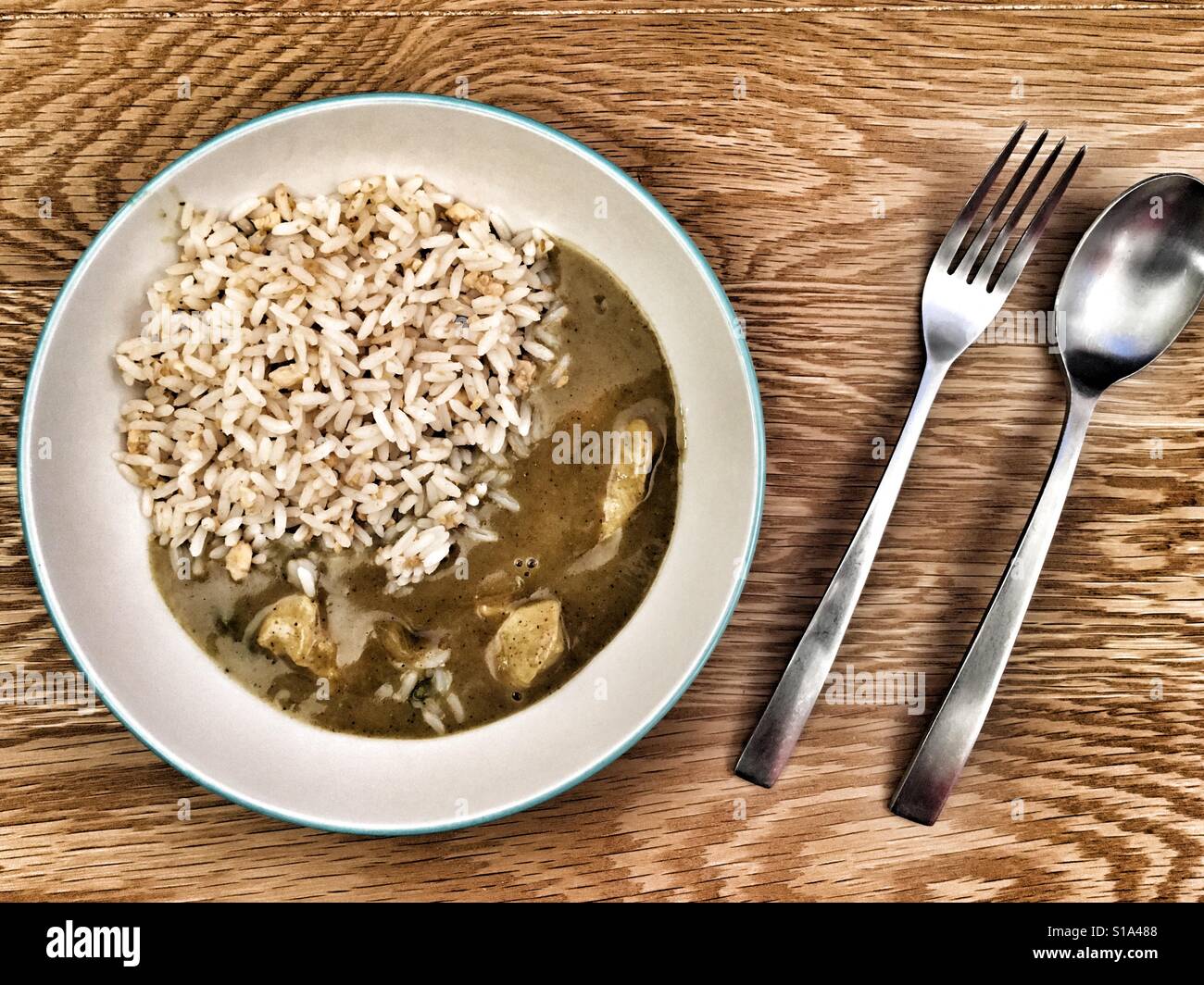 Chinese chicken curry with egg fried rice Stock Photo - Alamy