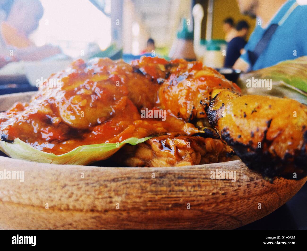 Malaysian Indonesian chicken with steamed rice. Stock Photo